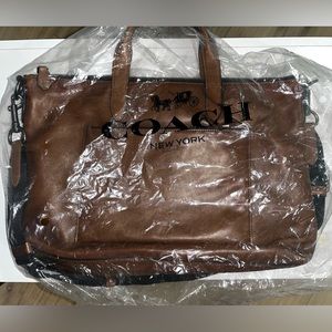 Coach brown leather briefcase.